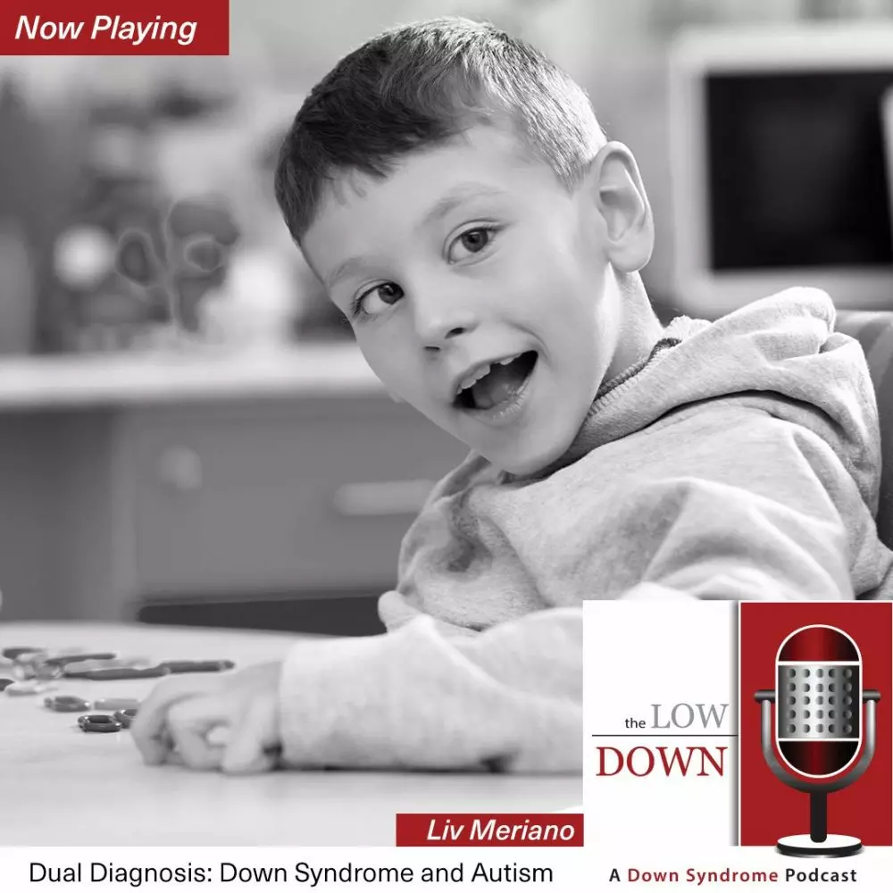 Boy with Down syndrome counting objects on table
