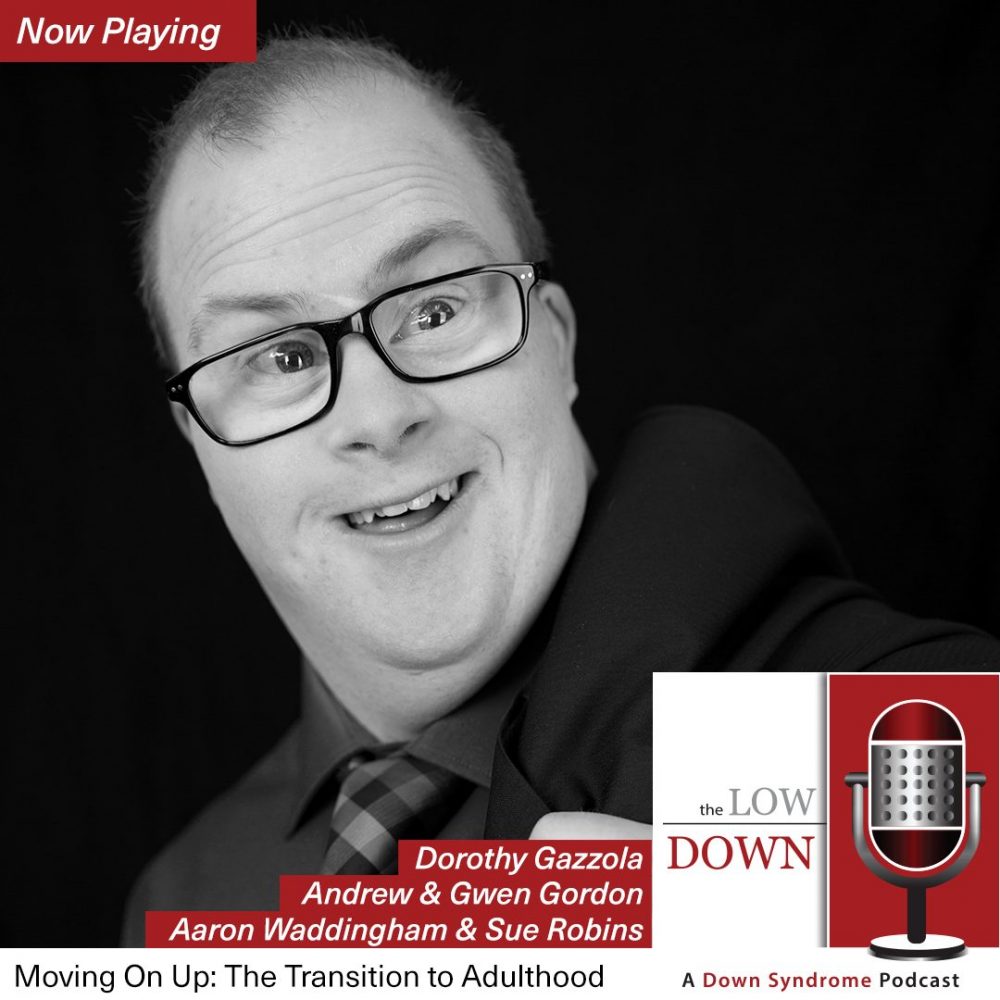 Man with Down syndrome with suit jacket slung over shoulder