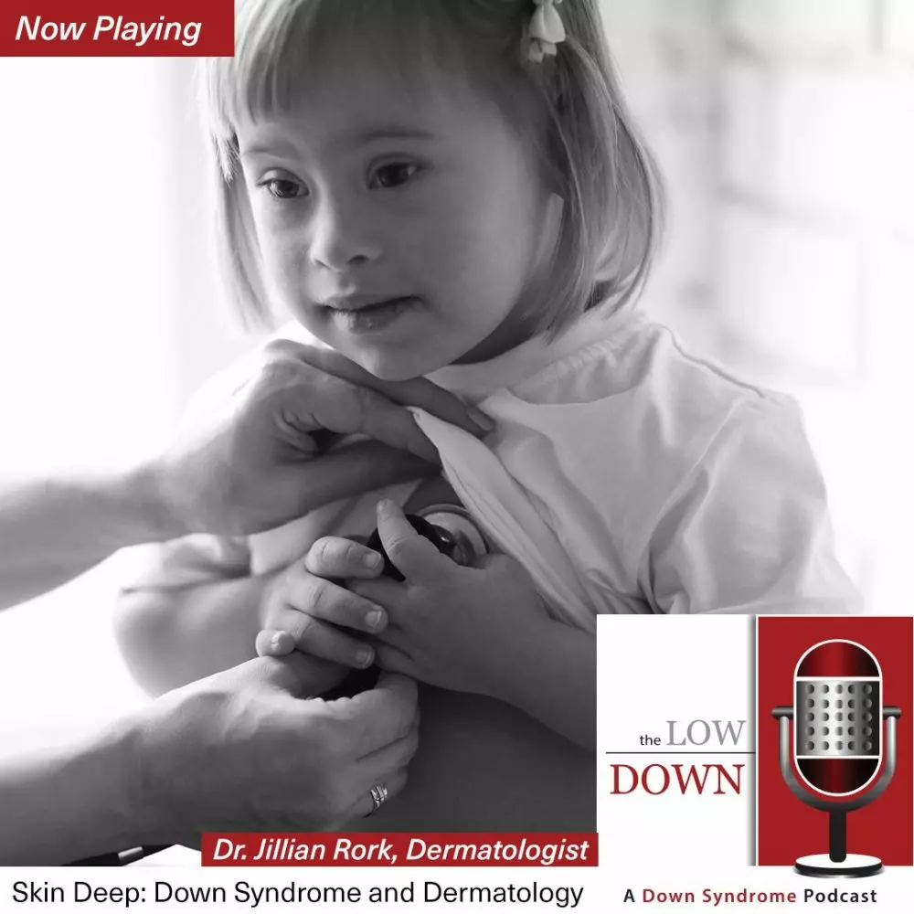 Young girl with Down syndrome being examined by doctor with stethescope