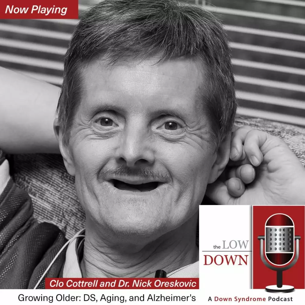 Older man with Down syndrome reclining on couch