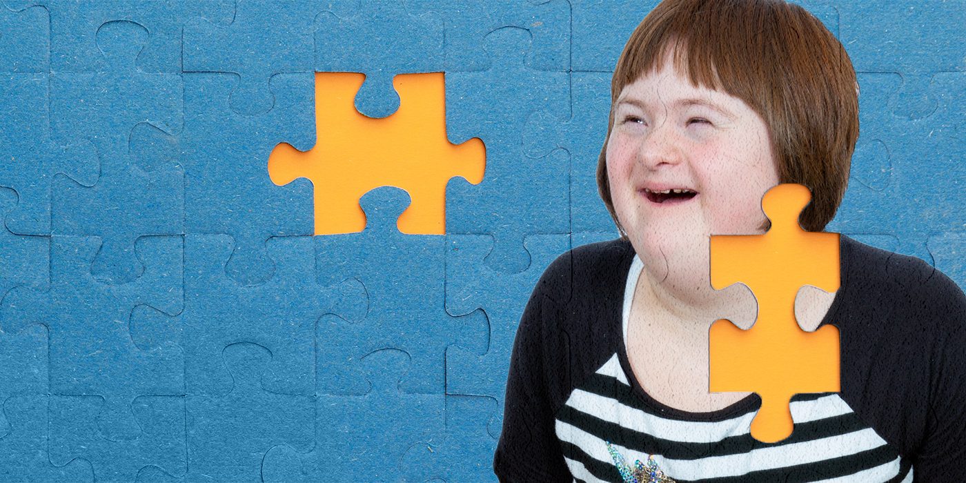 Puzzle of girl with Down syndrome and autism