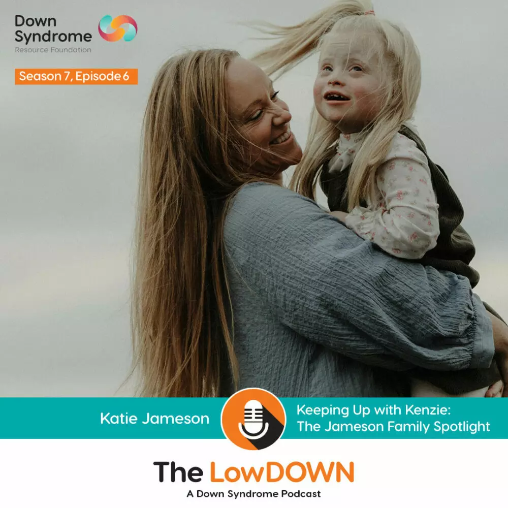 white mom with long blonde hair holds young girl with blonde hair and Down syndrome against cloudy sky