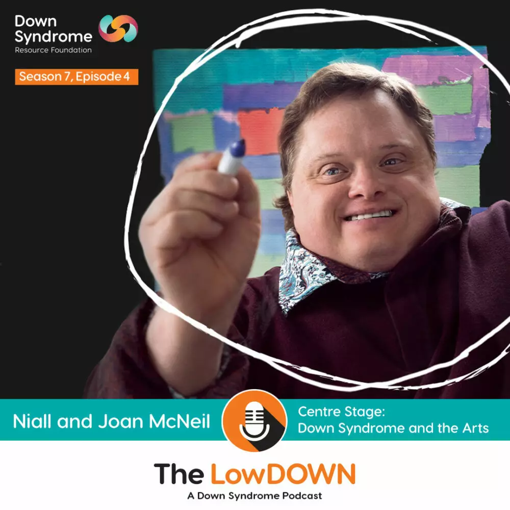 man with Down syndrome in front of colourful background draws a white circle around himself