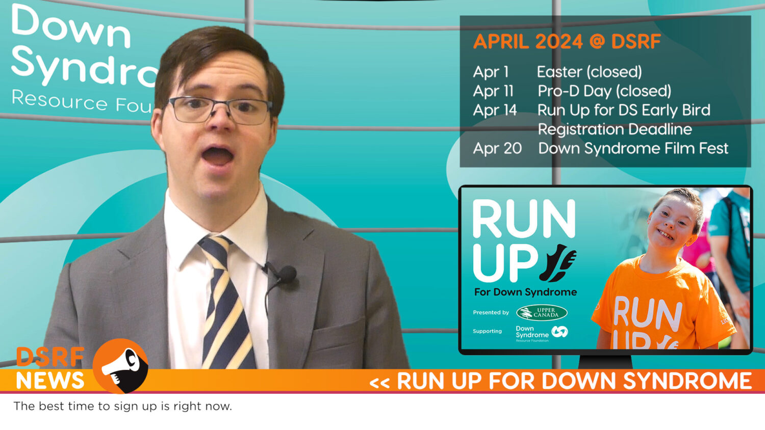 white man with Down syndrome, with brown hair, glasses, and grey suit delivers newscast from virtual news studio